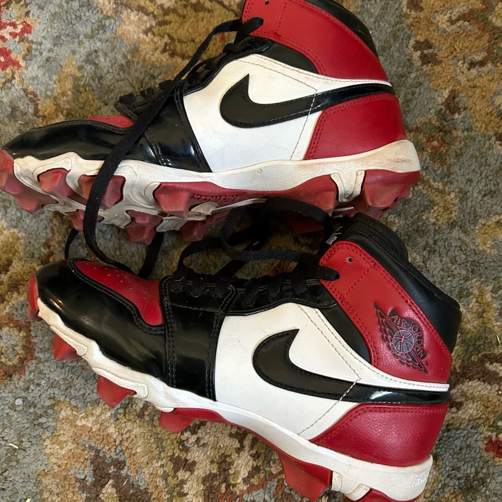 Nike Jordan 1 mid cleats. Red White and Black mid cleats size 5.5 Y.